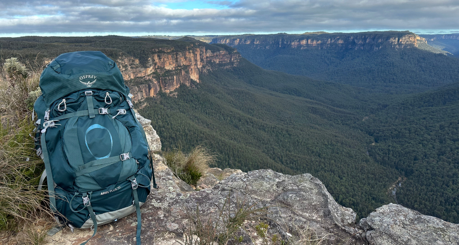 Full image of Osprey Ariel Plus 70 with mountainous backdrop